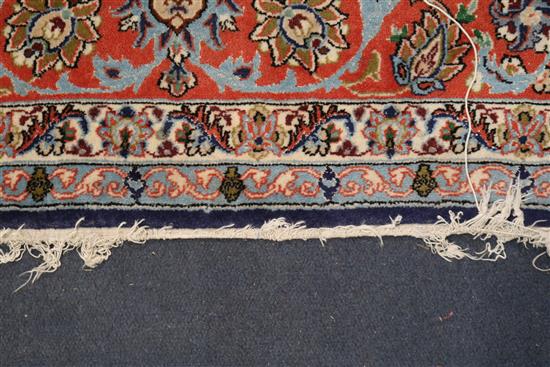 A Tabriz blue medallion rug 222 x 156cm.